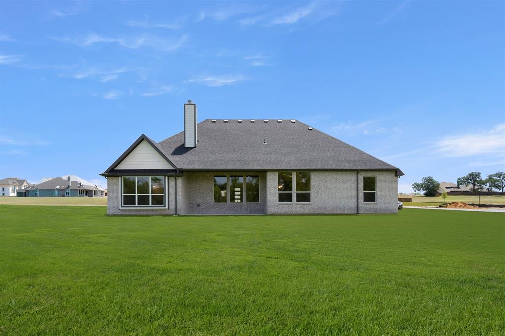 27 Old Crow Road Joshua, TX 76058 - Photo 29 of 35 a big house with a big yard and large trees
