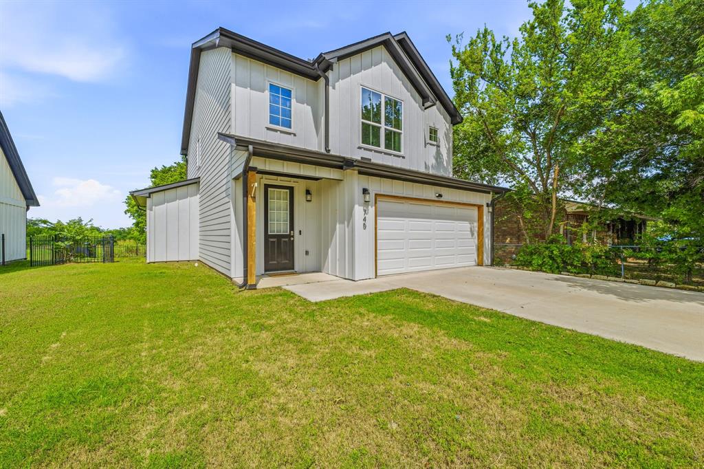 745 North Miller Avenue Stephenville, TX 76401 - Photo 1 of 31 Two-story residence featuring white vertical siding and dark trim