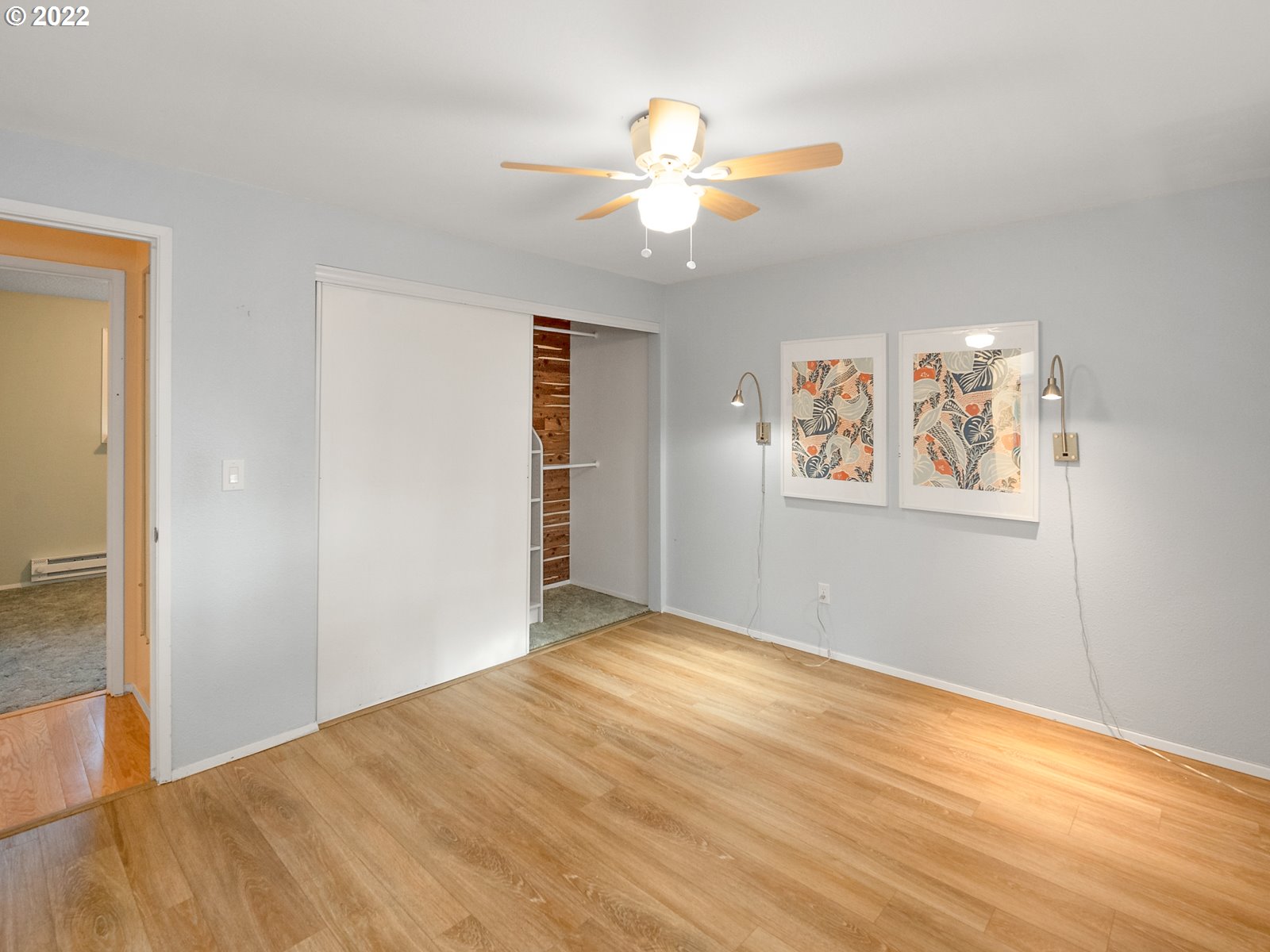 8810 Southeast Rural Street Portland, OR 97266 - Photo 19 of 32 a view of empty room with wooden floor