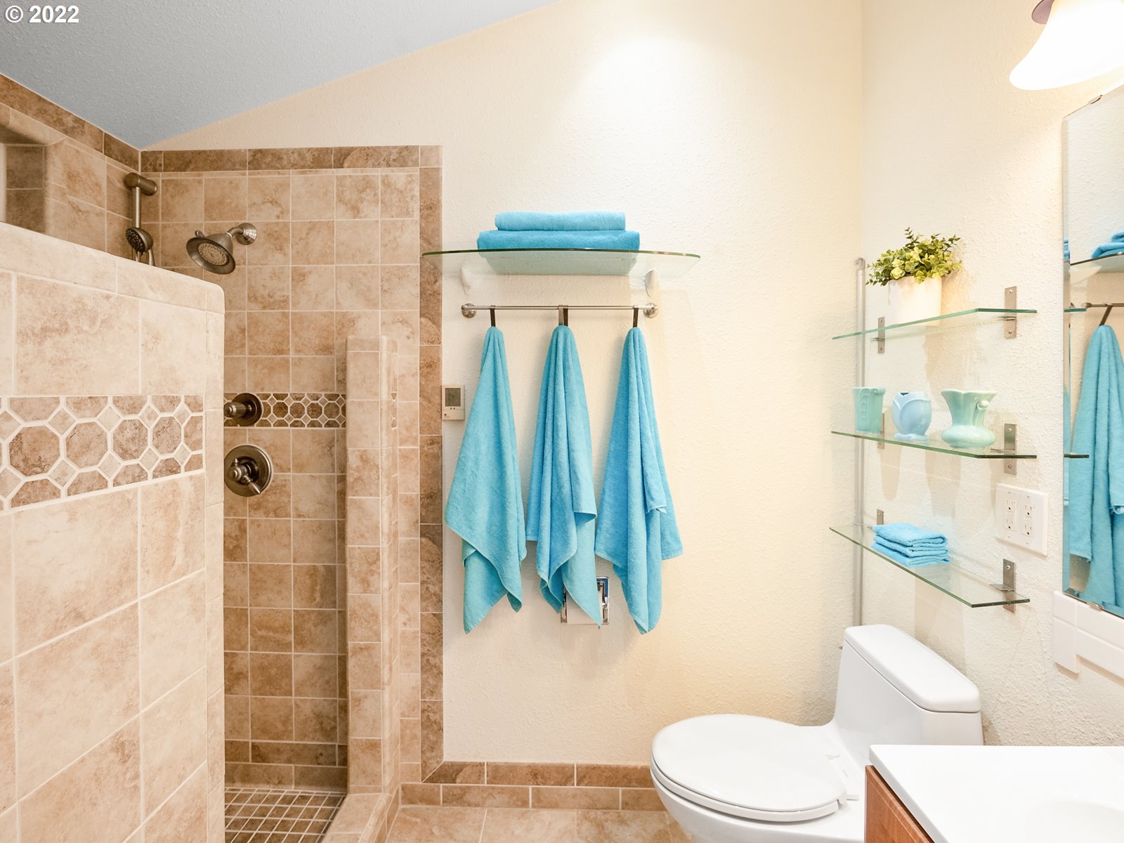 8810 Southeast Rural Street Portland, OR 97266 - Photo 23 of 32 a bathroom with a toilet a sink and shower
