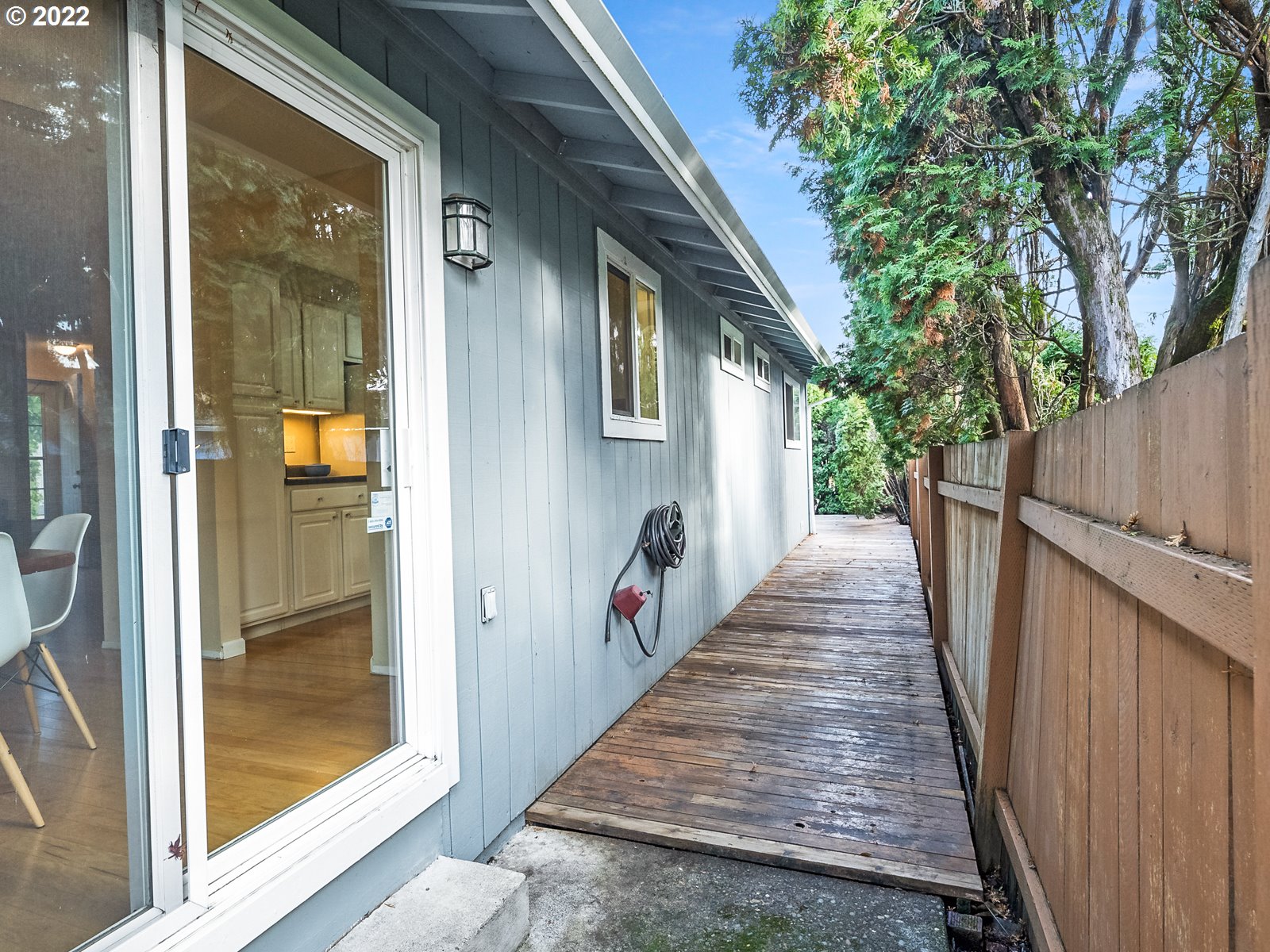 8810 Southeast Rural Street Portland, OR 97266 - Photo 30 of 32 a view of a corridor and stairs