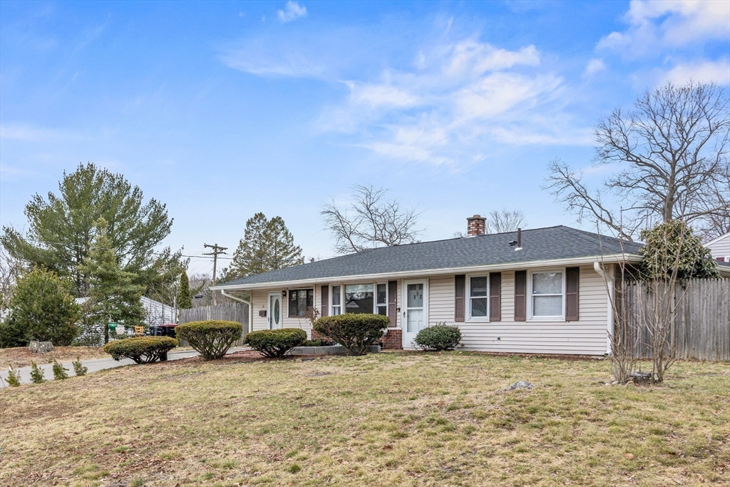 12 Dodge Road Brockton, MA 02302 - Photo 2 of 18 a front view of a house with a garden