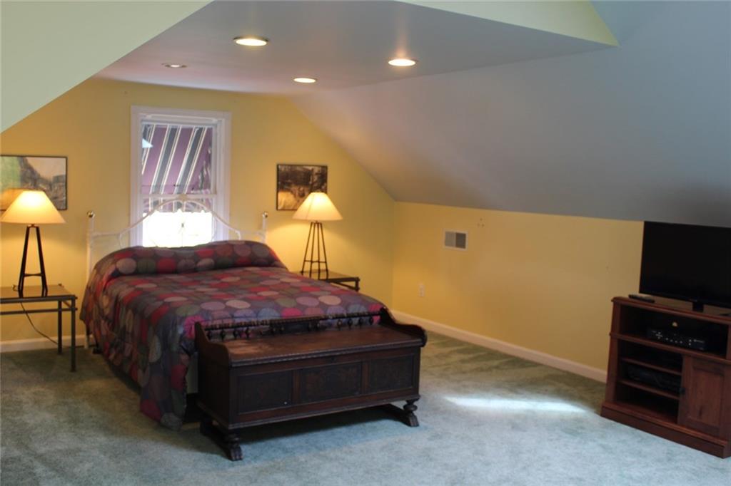 1531 Pennock Road Pittsburgh, PA 15212 - Photo 5 of 14 Relax in the large master suite with vaulted ceilings, skylights, full bathroom and walk-in closet.