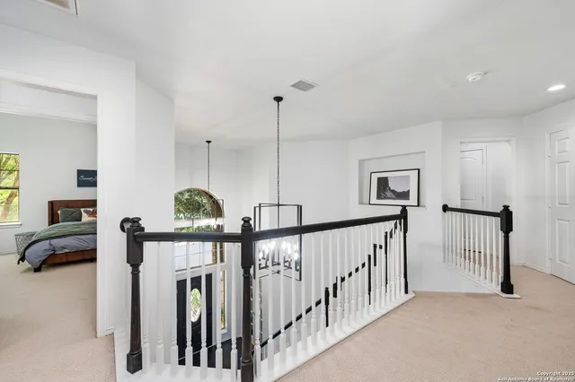 a view of hallway with livingroom