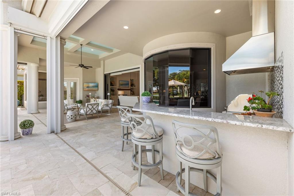 4170 Cortland Way Naples, FL 34119 - Photo 31 of 41 View of patio featuring ceiling fan