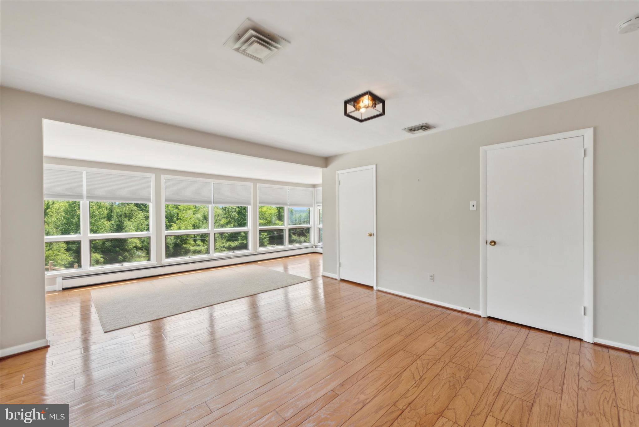 217 Downing Road Downingtown, PA 19335 - Photo 11 of 38 Master Suite with a Wall of Windows