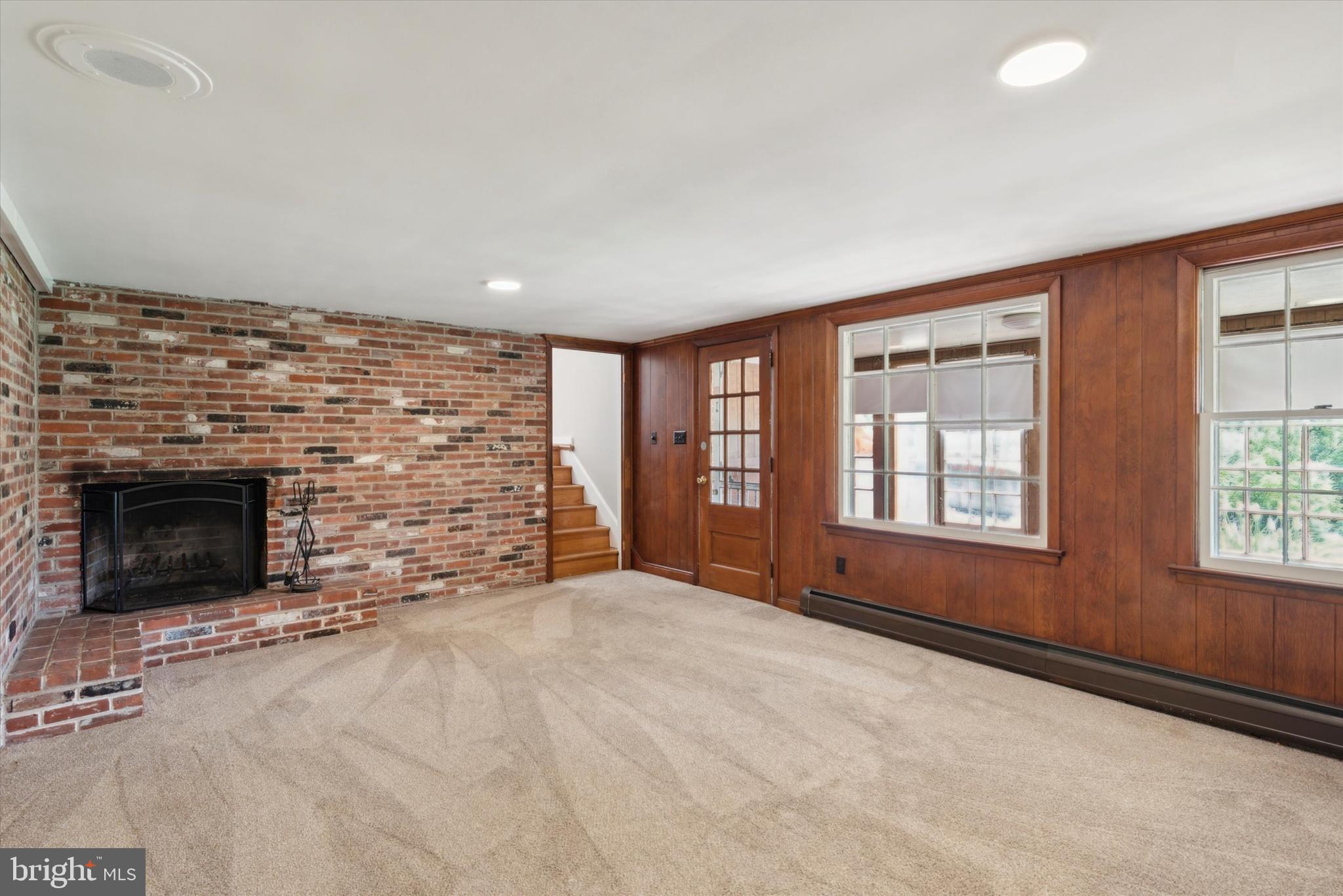 217 Downing Road Downingtown, PA 19335 - Photo 17 of 38 Fireside Lower Level has access to Enclosed Porch