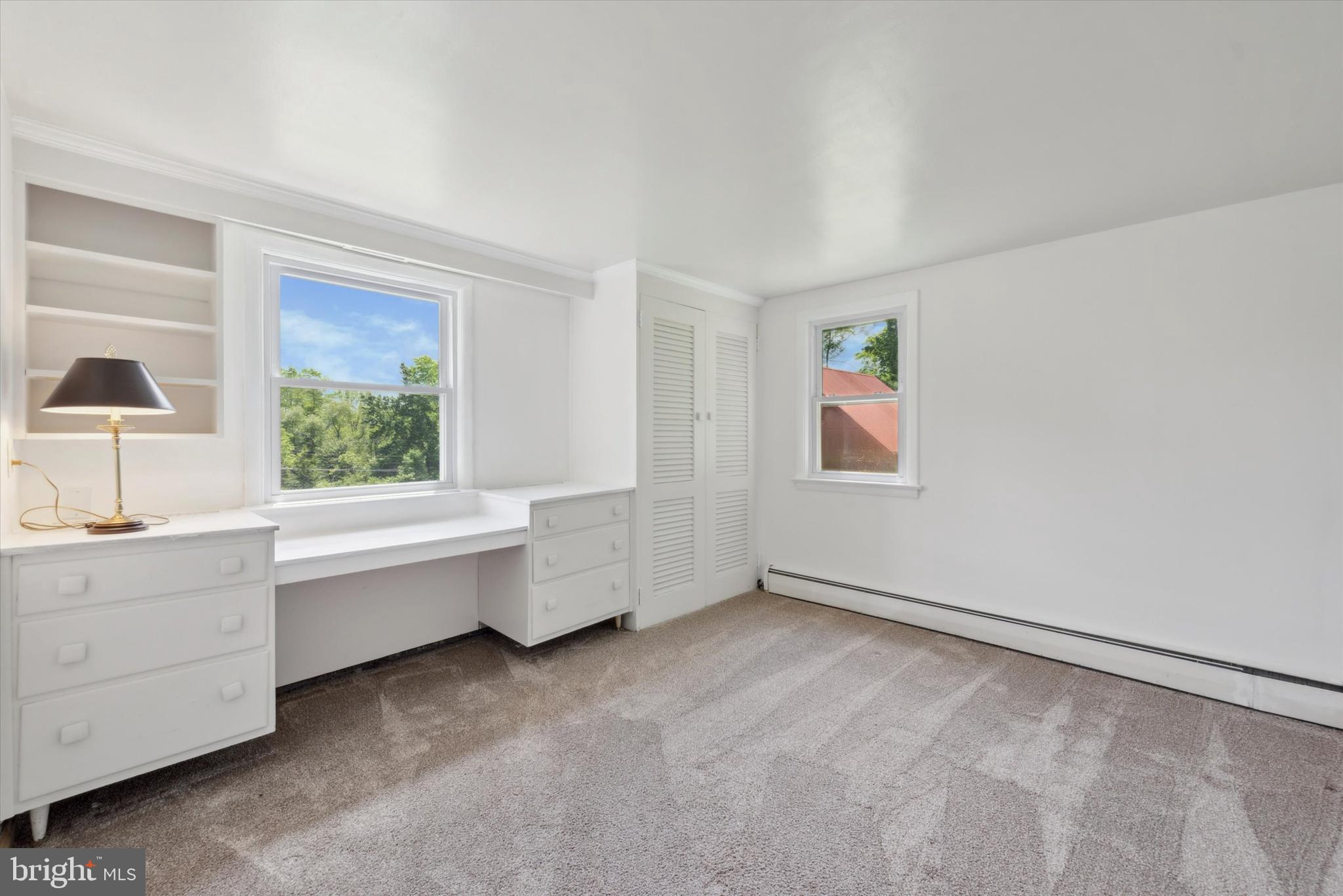 217 Downing Road Downingtown, PA 19335 - Photo 20 of 38 Another Sunlit Lower Level Bedroom with Built-ins