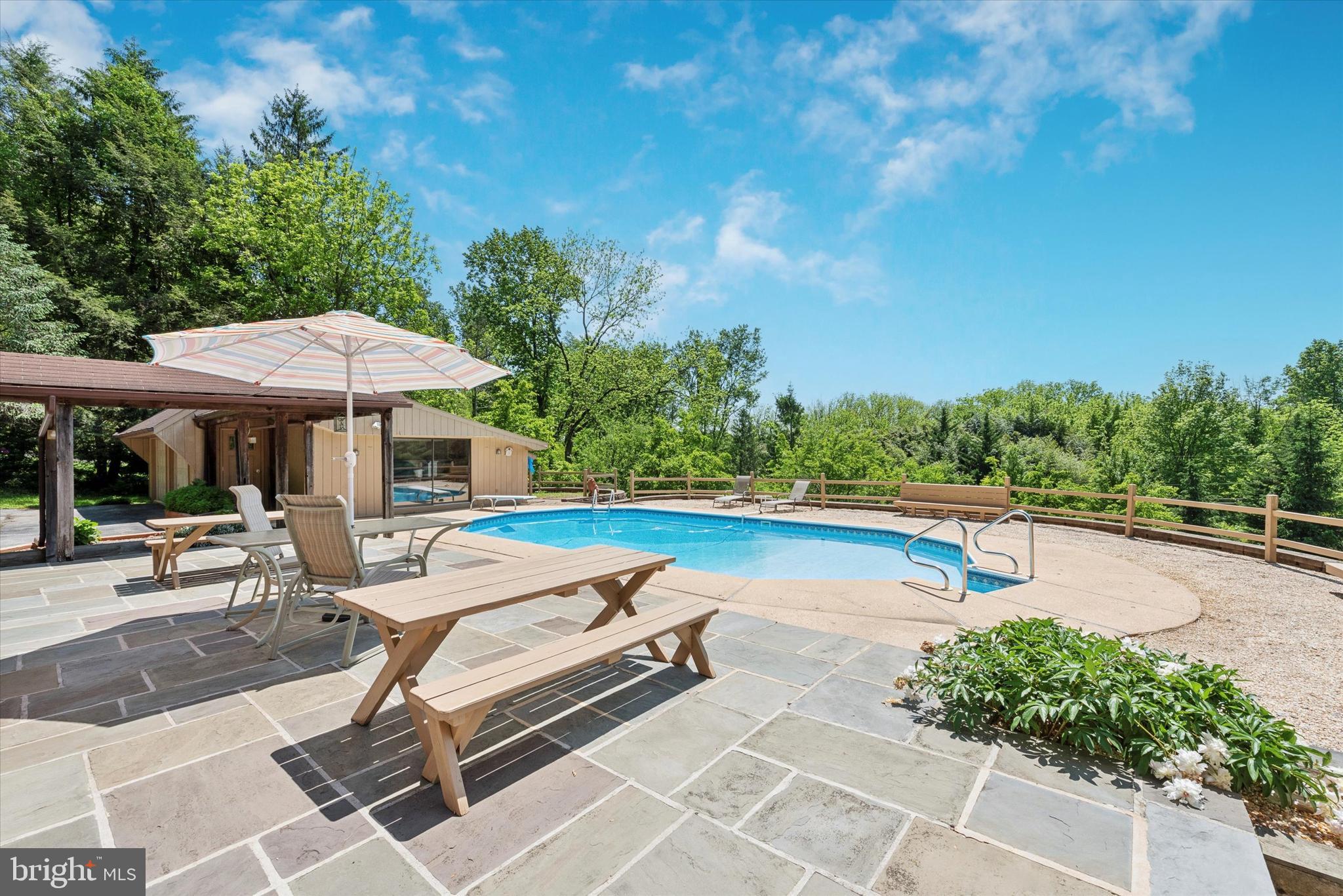 217 Downing Road Downingtown, PA 19335 - Photo 22 of 38 Expansive Poolside Patio Area