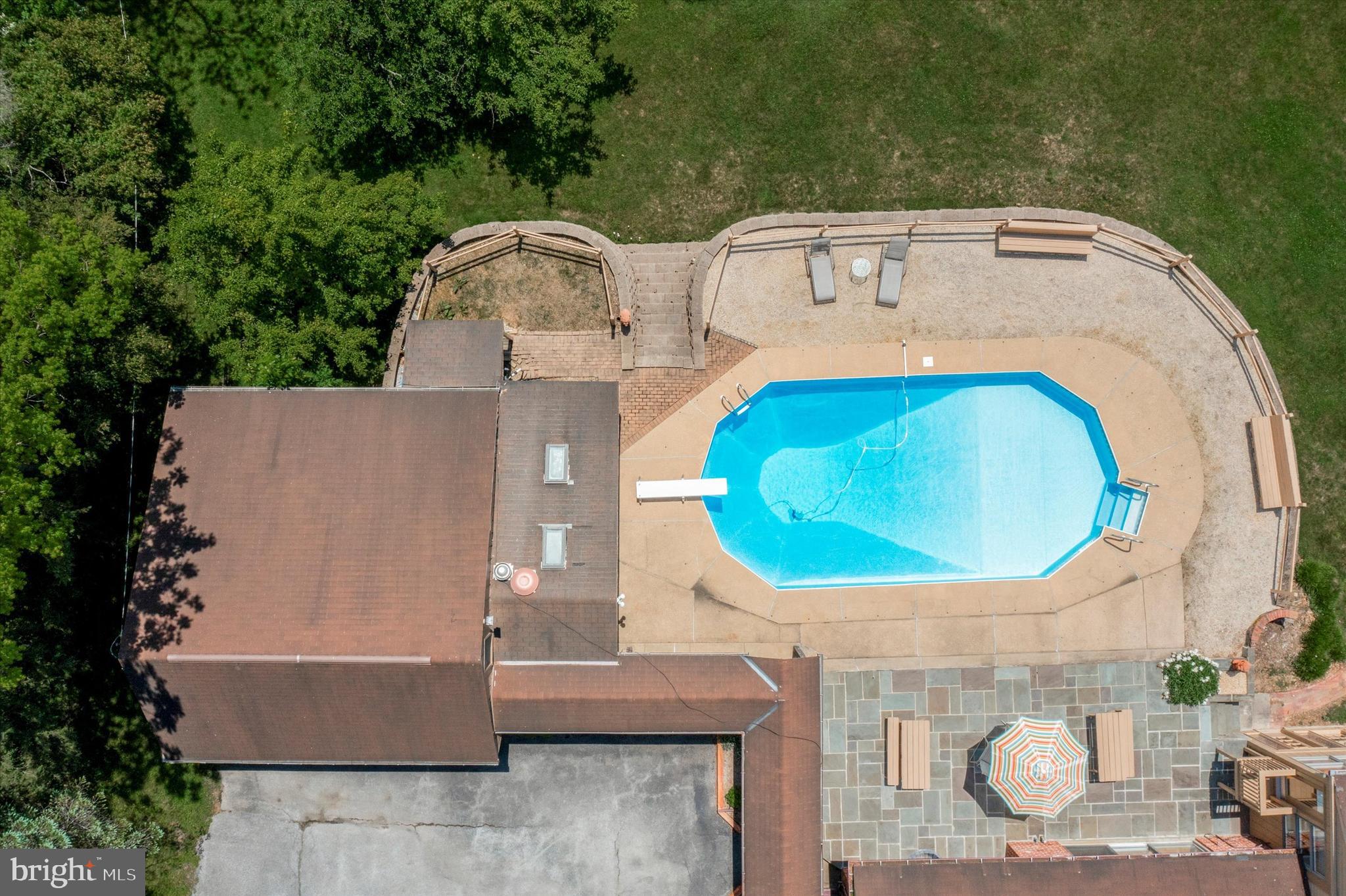 217 Downing Road Downingtown, PA 19335 - Photo 23 of 38 Large Deck area surrounding the Pool