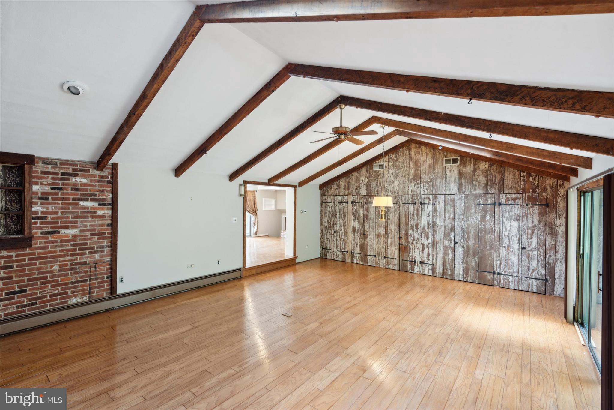 217 Downing Road Downingtown, PA 19335 - Photo 4 of 38 Soaring Beamed Ceiling with Skylights in Family Rm