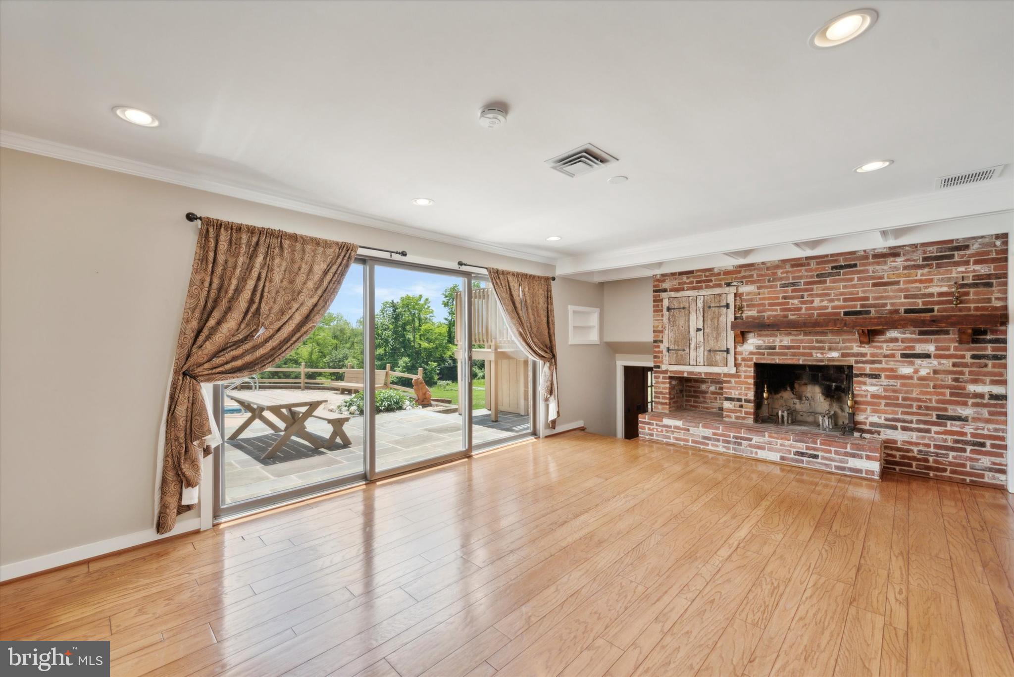217 Downing Road Downingtown, PA 19335 - Photo 6 of 38 Fireside Dining Rm with sliders to Patio