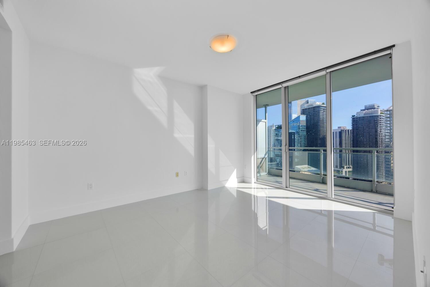 92 Southwest 3rd Street, Unit 3904 Miami, FL 33130 - Photo 13 of 30 a view of an empty room with window