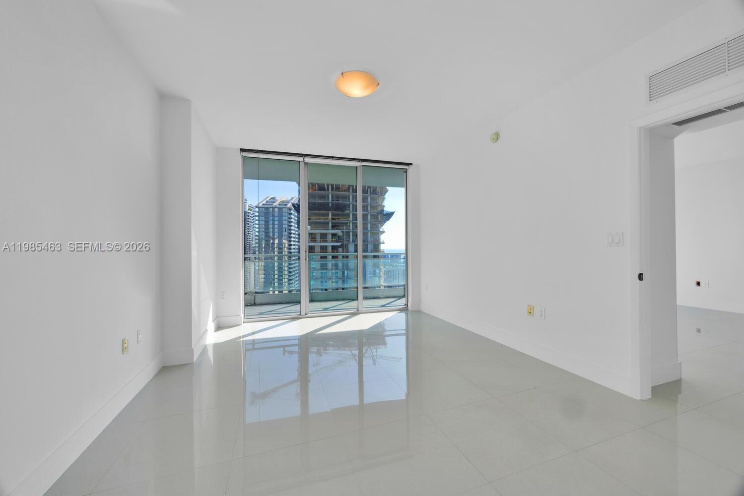 92 Southwest 3rd Street, Unit 3904 Miami, FL 33130 - Photo 14 of 30 a view of an empty room with a window
