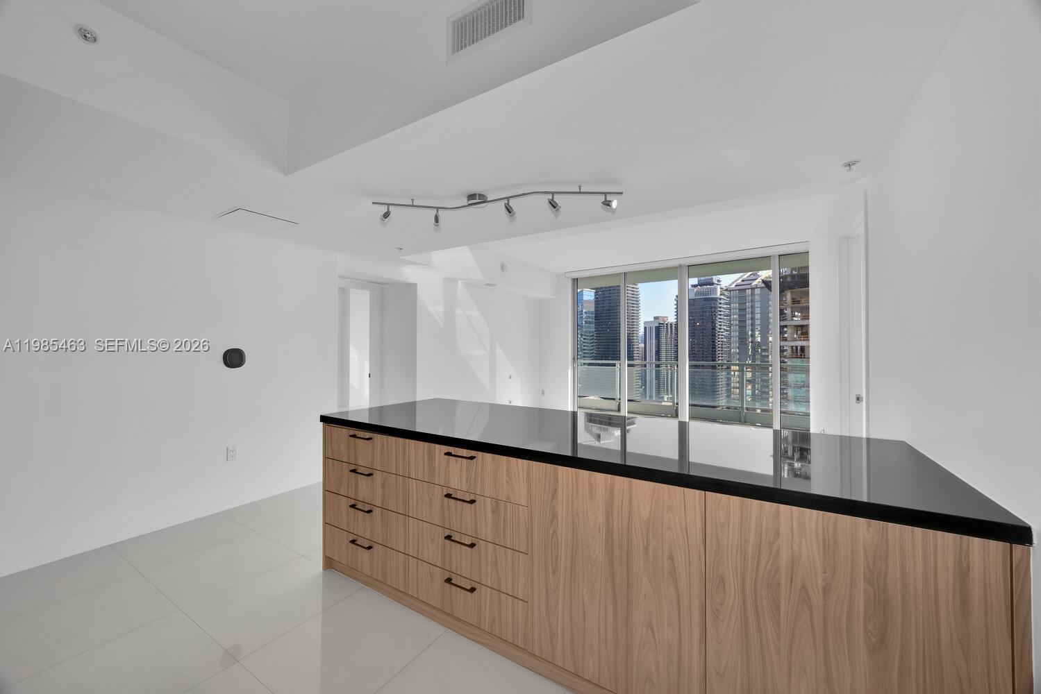 92 Southwest 3rd Street, Unit 3904 Miami, FL 33130 - Photo 10 of 30 a very nice looking room with a large window