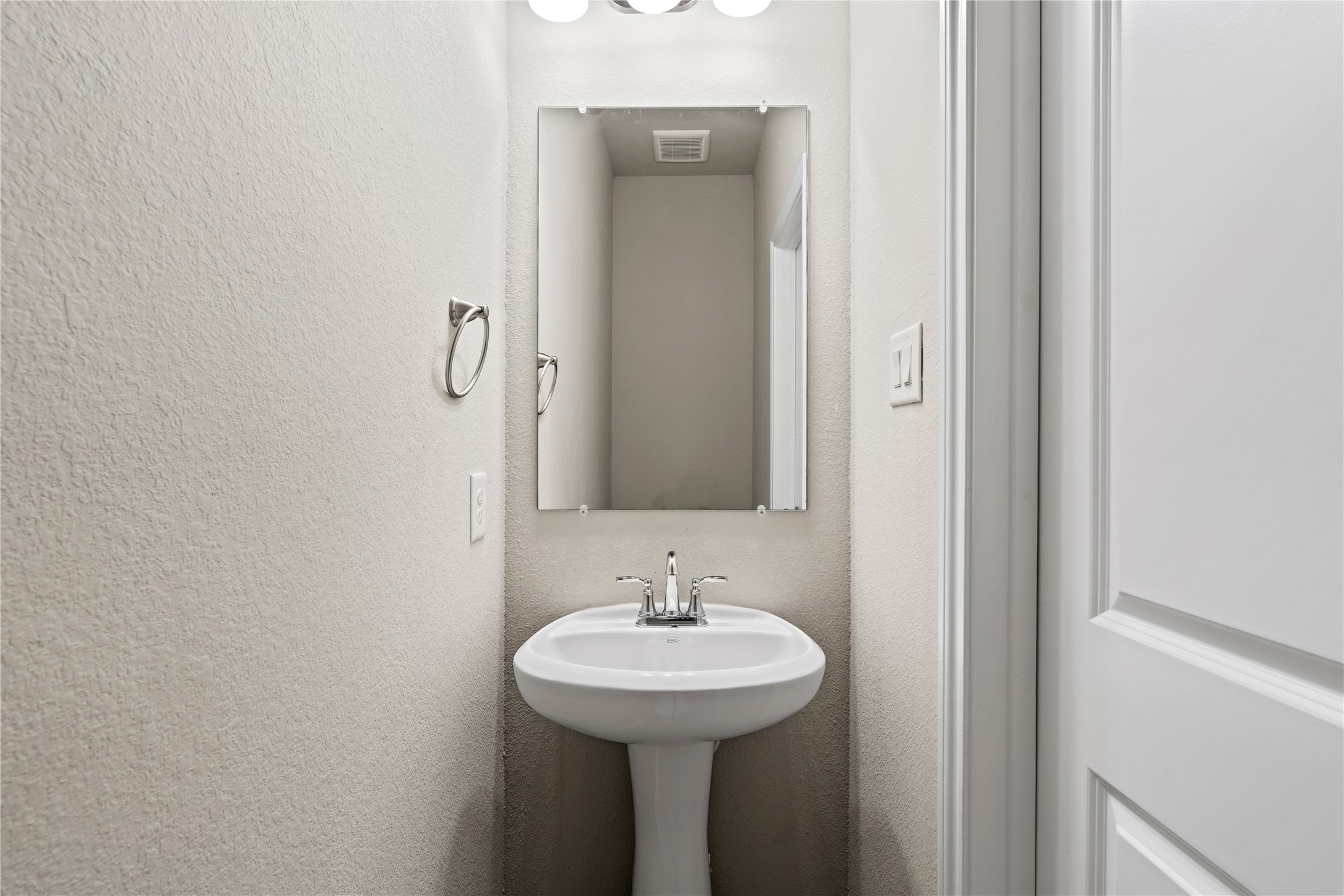 2522 Terrace Point Drive Missouri City, TX 77459 - Photo 12 of 25 a bathroom with a sink and a mirror