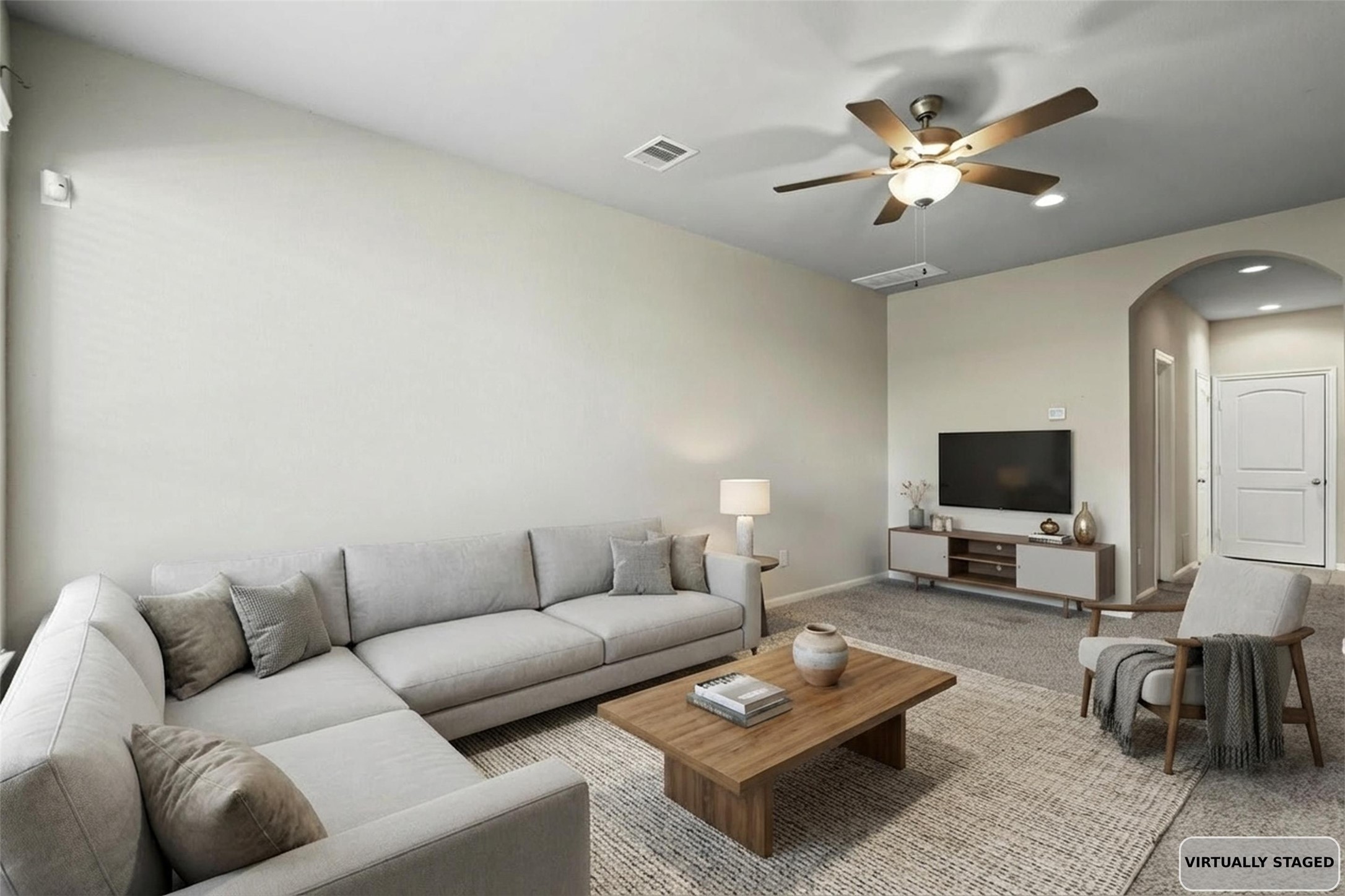 2522 Terrace Point Drive Missouri City, TX 77459 - Photo 20 of 25 a living room with furniture and a flat screen tv