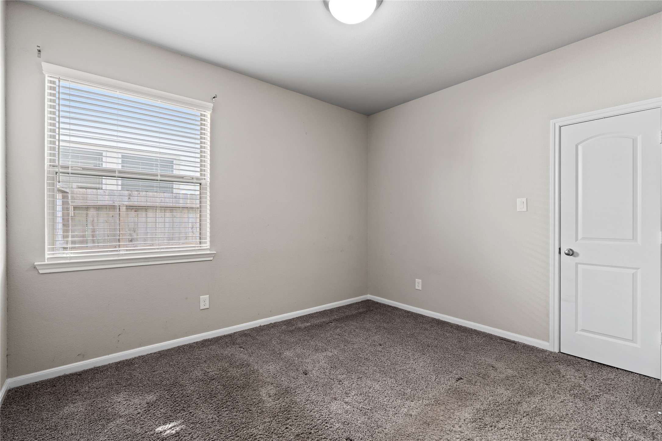 2522 Terrace Point Drive Missouri City, TX 77459 - Photo 21 of 25 an empty room with a window