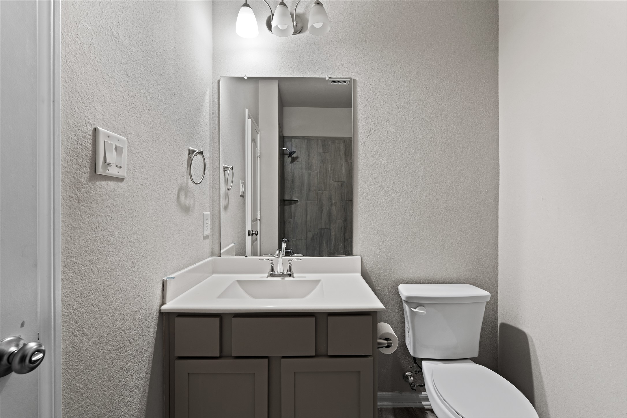 2522 Terrace Point Drive Missouri City, TX 77459 - Photo 23 of 25 a bathroom with a sink mirror and toilet