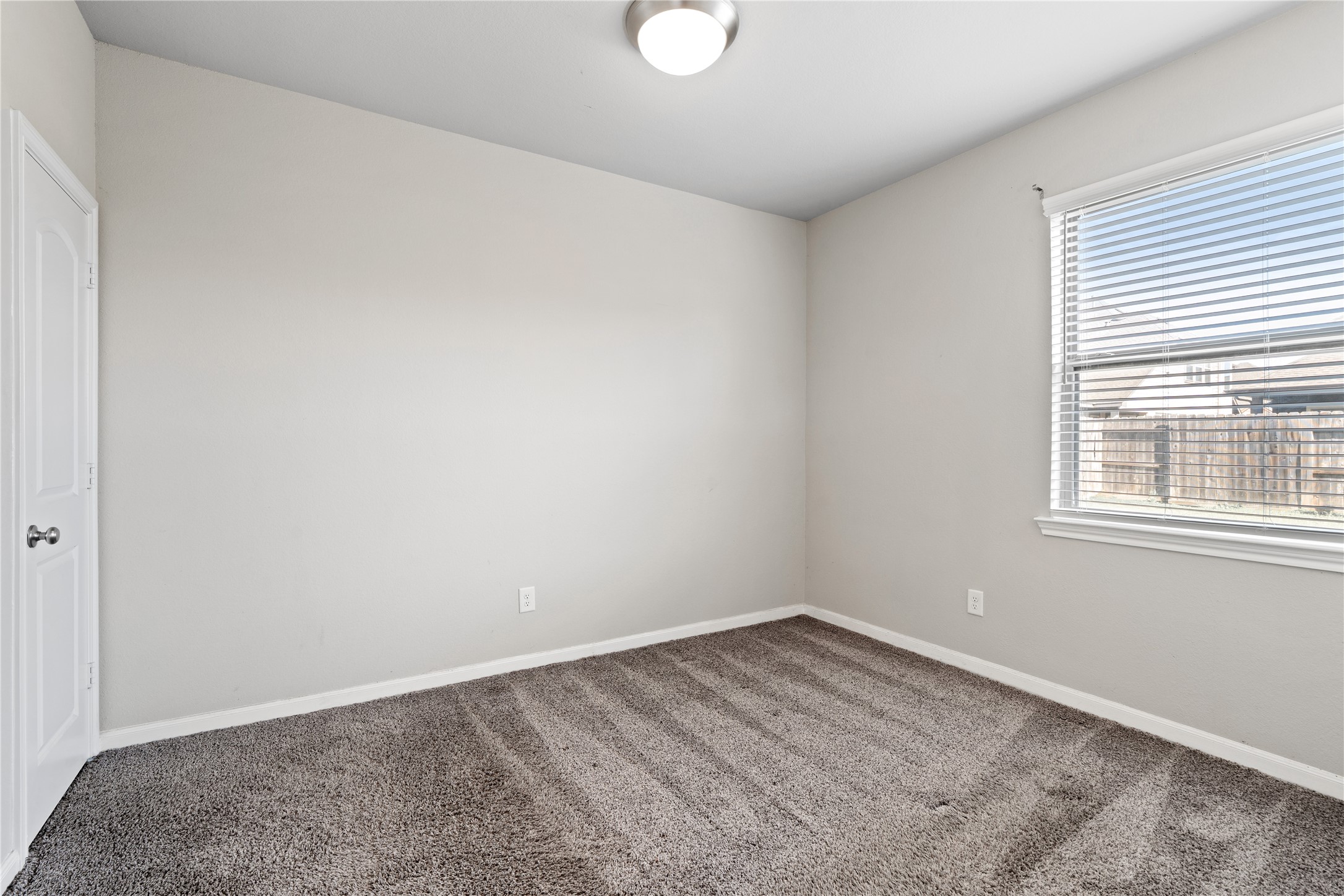 2522 Terrace Point Drive Missouri City, TX 77459 - Photo 24 of 25 an empty room with a window