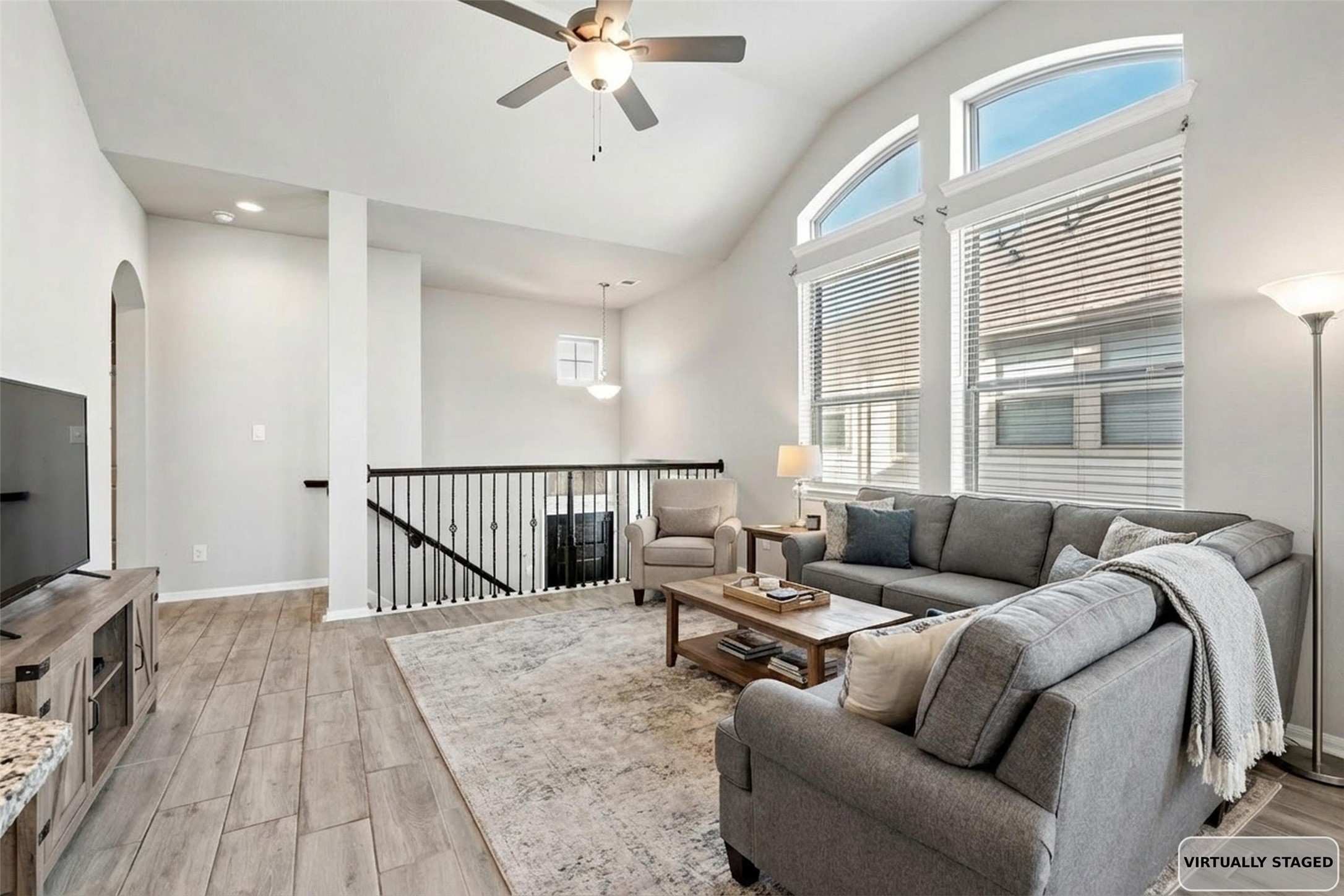 2522 Terrace Point Drive Missouri City, TX 77459 - Photo 5 of 25 a living room with furniture and a flat screen tv