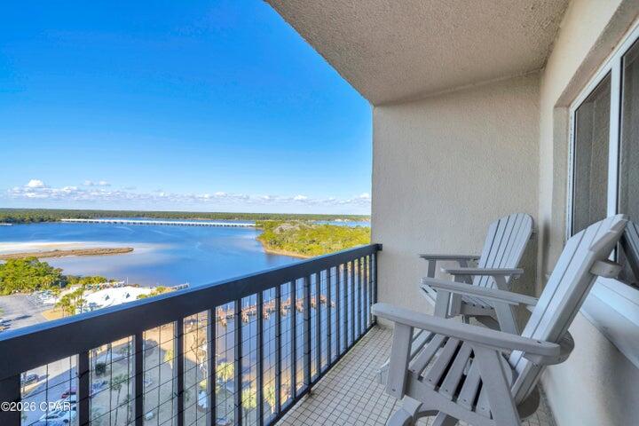 a view of a balcony with an ocean view