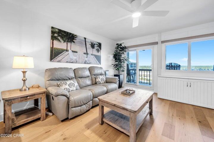 23223 Front Beach Road, Unit A1 PH10 Panama City Beach, FL 32413 - Photo 2 of 32 a living room with furniture and a window