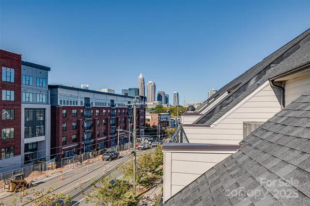 a view of a balcony with city view
