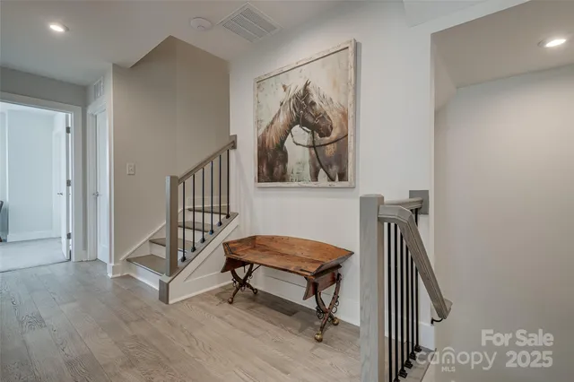 a bedroom with a bed and ceiling fan