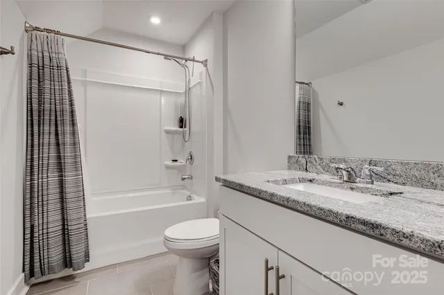 a view of entryway with wooden floor and stairs