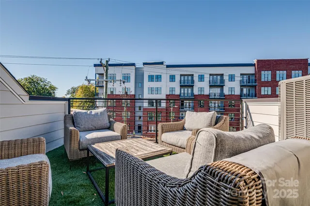 a living room with a couch and a large window