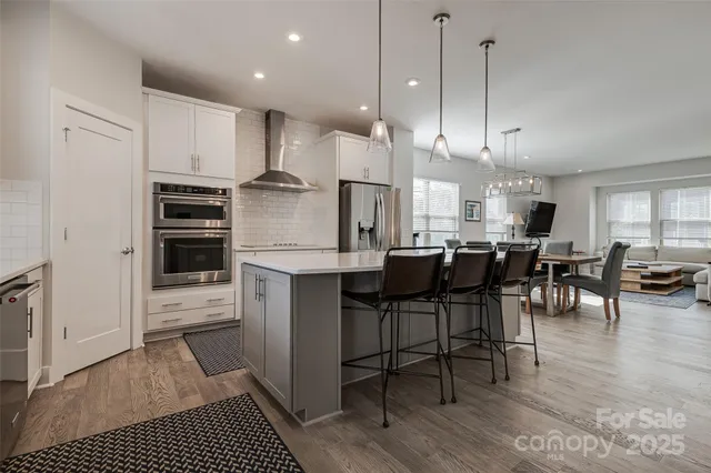 a kitchen with appliances and cabinets