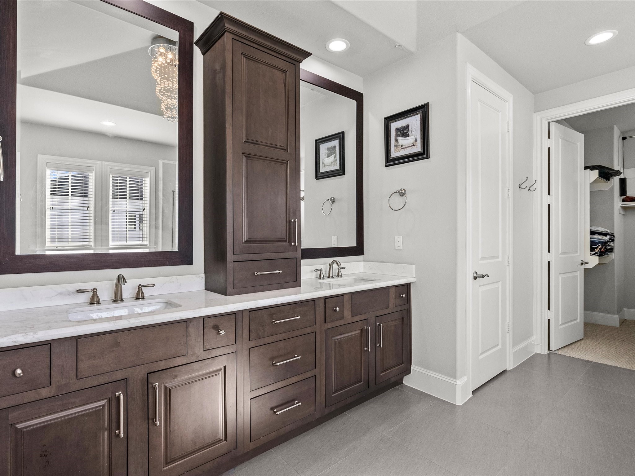 5616 Cohn Terrace Houston, TX 77007 - Photo 19 of 33 a bathroom with a double vanity sink double and mirror