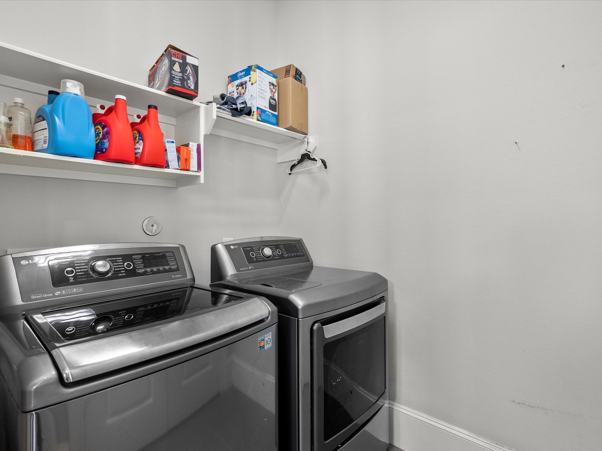 5616 Cohn Terrace Houston, TX 77007 - Photo 29 of 33 a utility room with dryer and washer