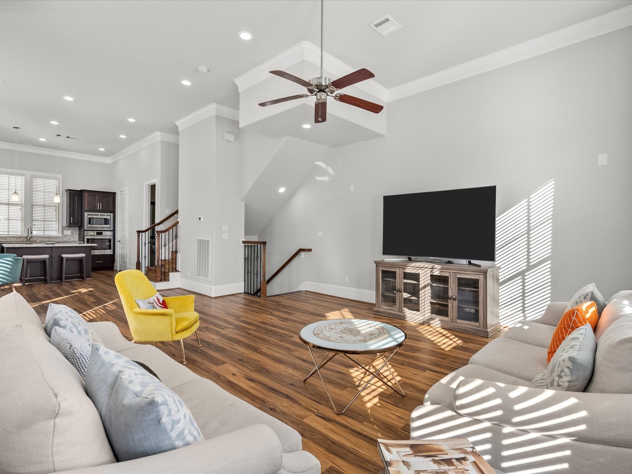 5616 Cohn Terrace Houston, TX 77007 - Photo 10 of 33 a living room with furniture and a flat screen tv