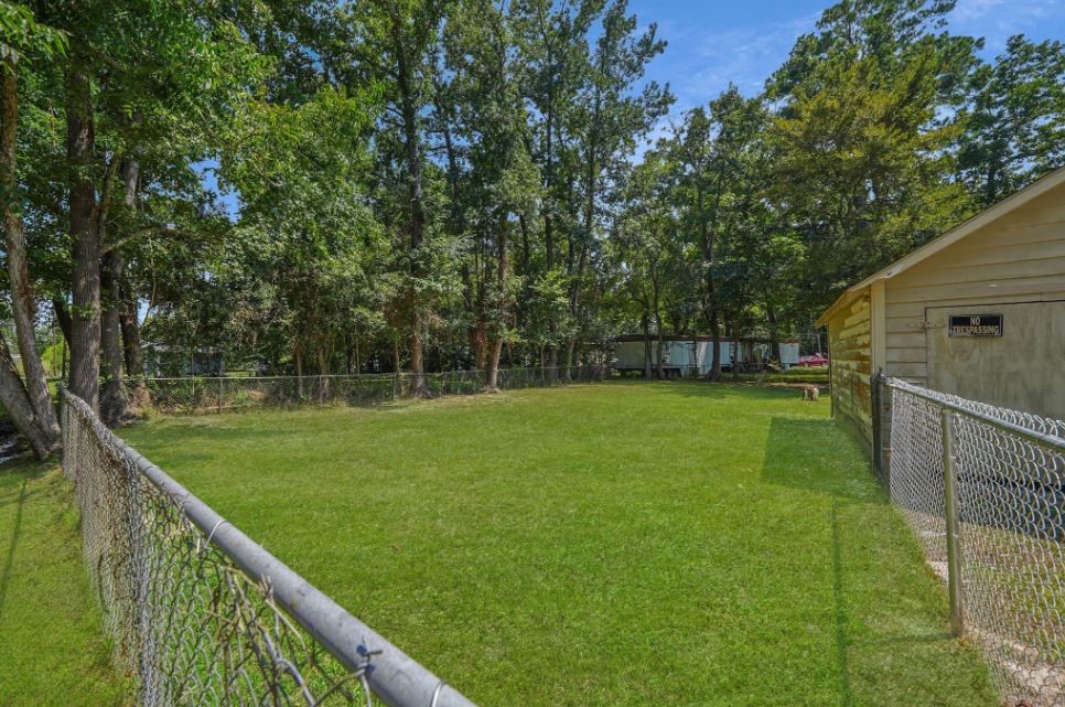 701 Clay Street Cleveland, TX 77327 - Photo 15 of 18 Gated backyard behind house