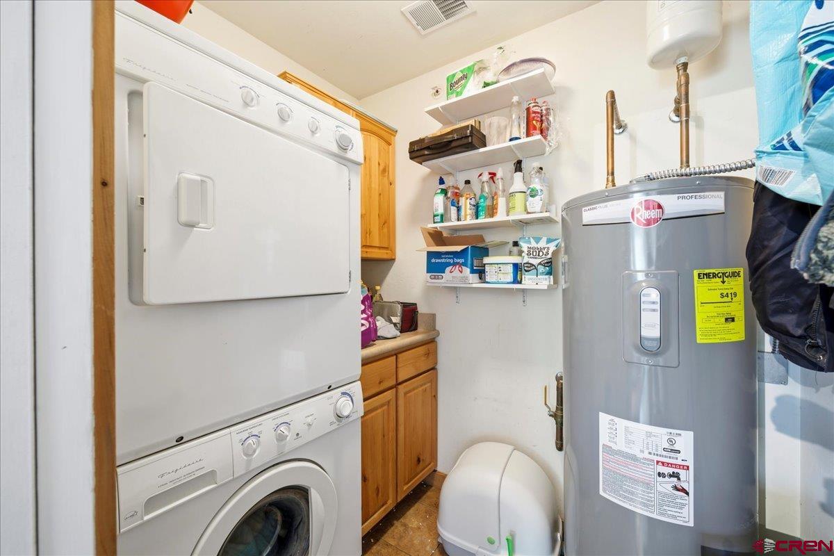 520 Redcliff Circle, Unit G203 Ridgway, CO 81432 - Photo 17 of 25 a utility room with dryer and washer
