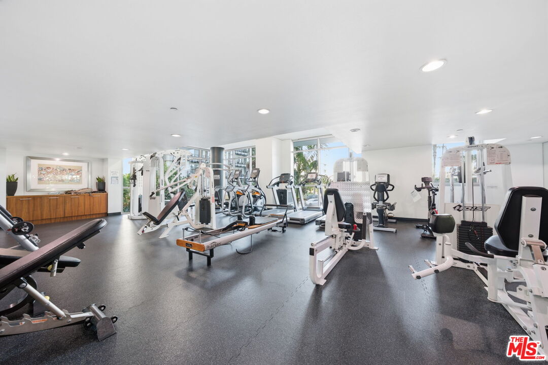 13650 Marina Pointe Drive, Unit 1603 Marina del Rey, CA 90292 - Photo 69 of 75 a view of a room with gym equipment