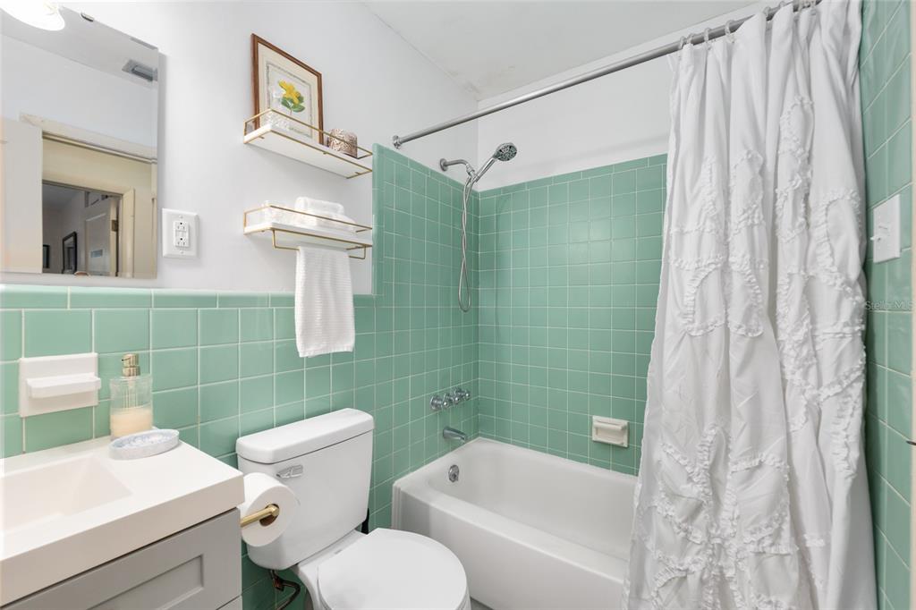 3018 Northwest 2nd Avenue Gainesville, FL 32607 - Photo 15 of 21 a bathroom with a toilet sink and shower