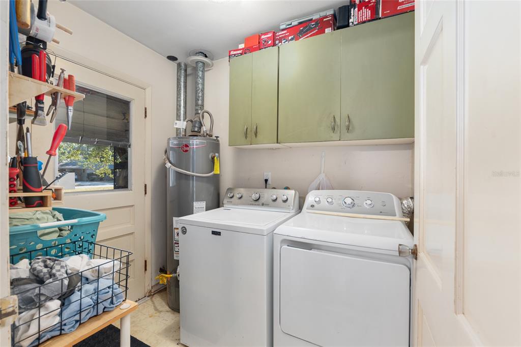 3018 Northwest 2nd Avenue Gainesville, FL 32607 - Photo 16 of 21 a utility room with dryer and washer