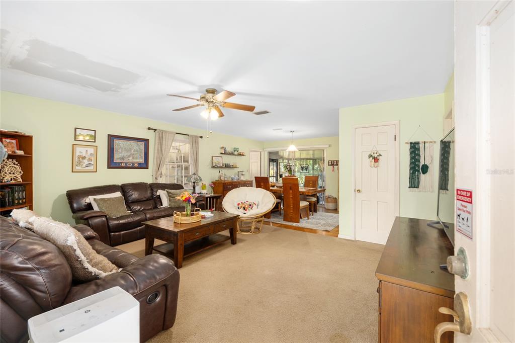 3018 Northwest 2nd Avenue Gainesville, FL 32607 - Photo 4 of 21 a bedroom with furniture and a wooden floor