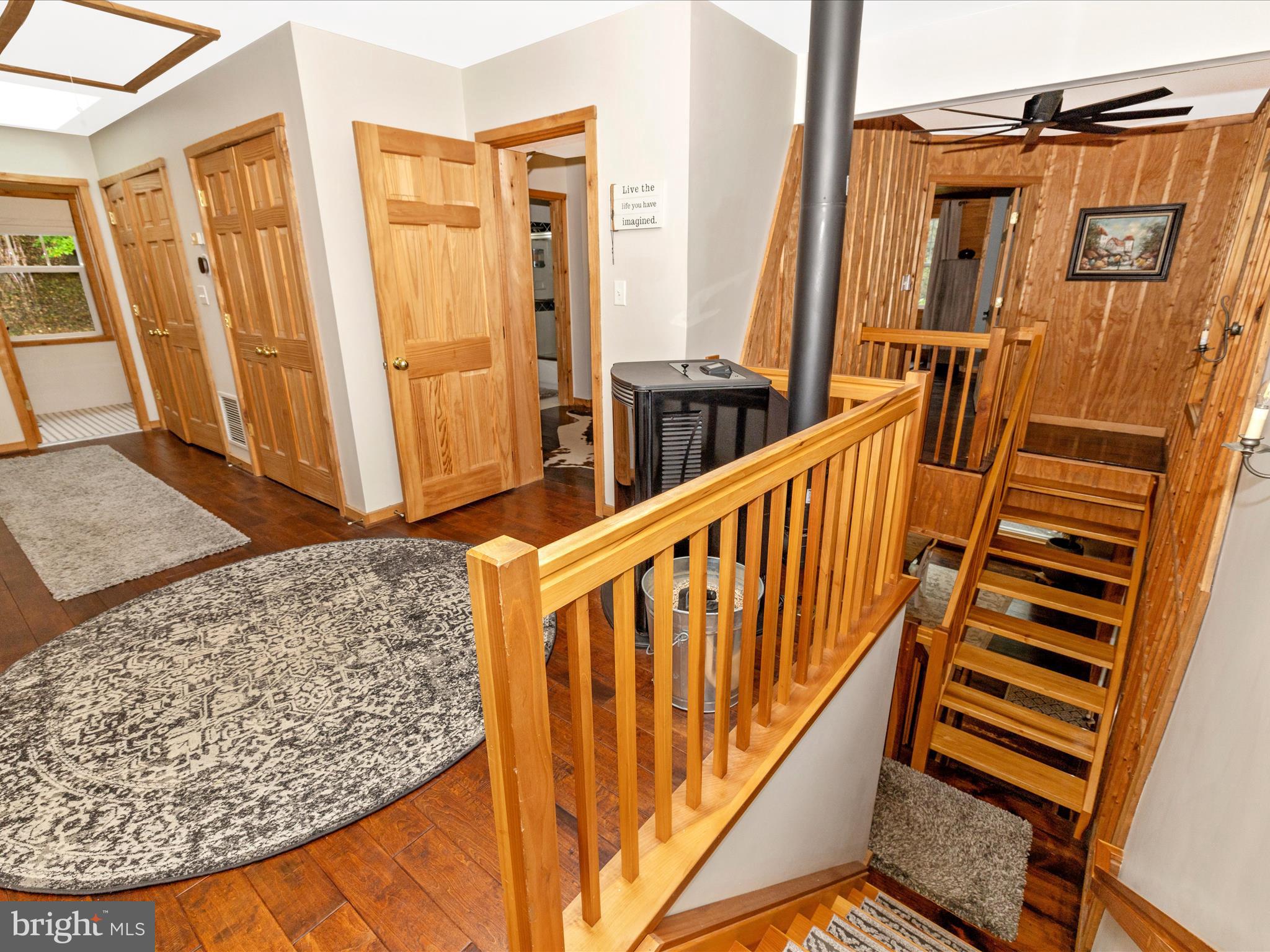 8935 Hawbottom Road Middletown, MD 21769 - Photo 21 of 84 a view of a porch with wooden floor and stairs