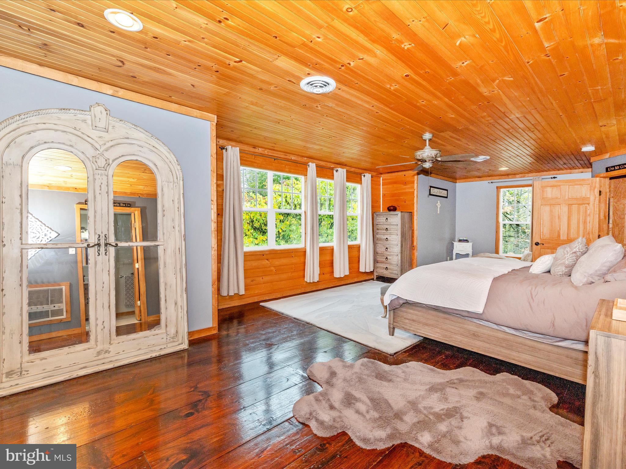 8935 Hawbottom Road Middletown, MD 21769 - Photo 24 of 84 a spacious bedroom with a bed and a large window with outer view