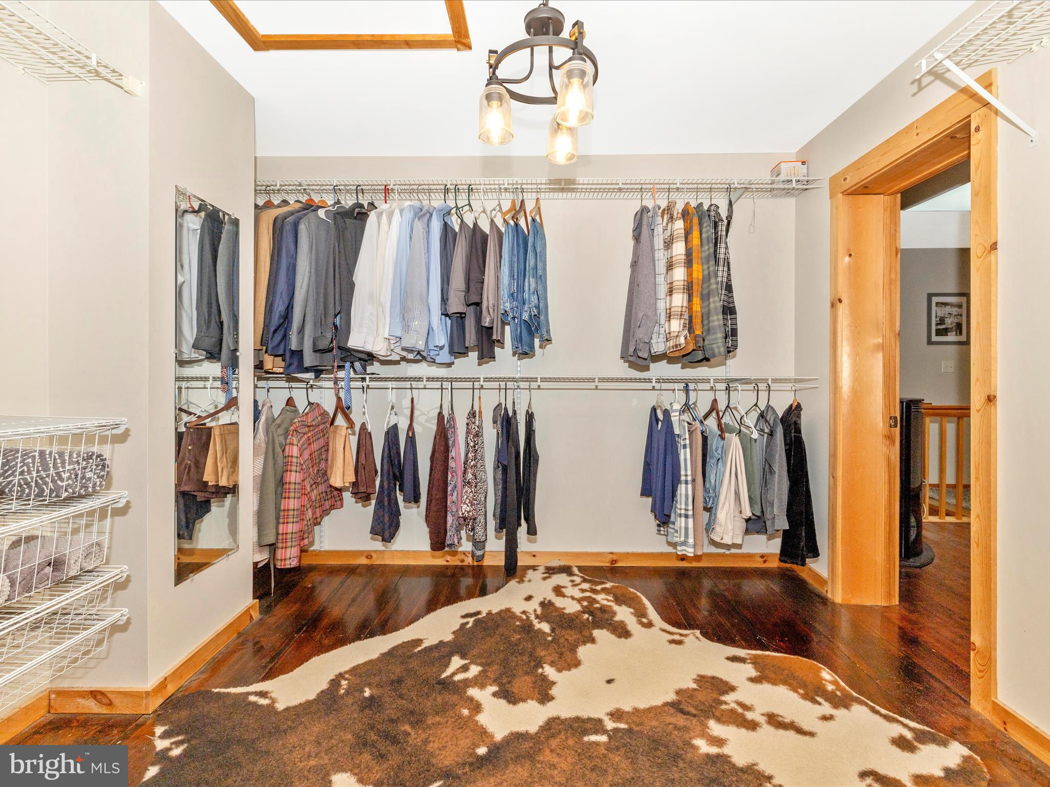 8935 Hawbottom Road Middletown, MD 21769 - Photo 30 of 84 a view of walk in closet with clothes and shoes