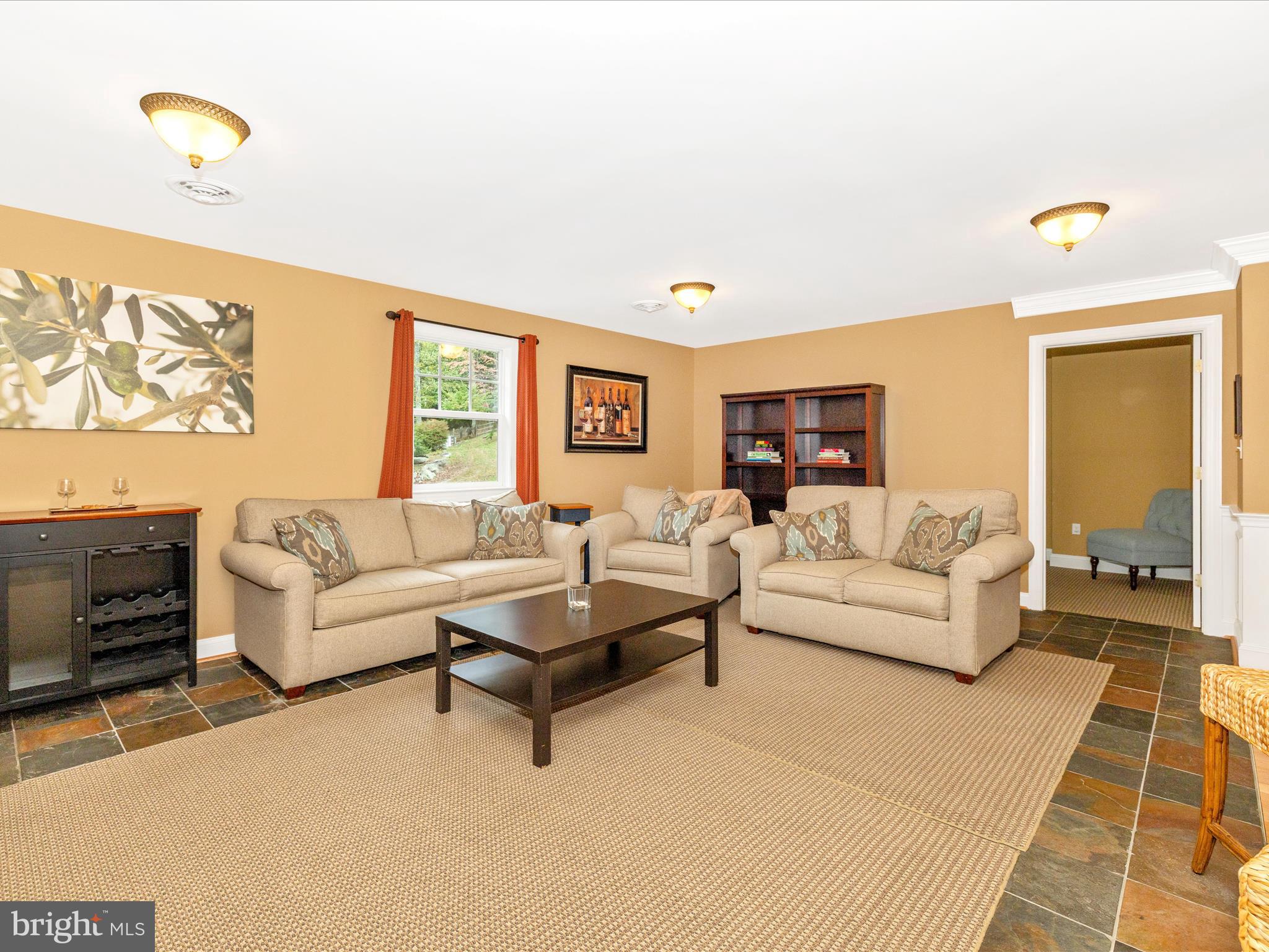 8935 Hawbottom Road Middletown, MD 21769 - Photo 56 of 84 a living room with furniture and a window