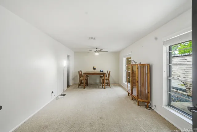 a view of a livingroom with a staircase