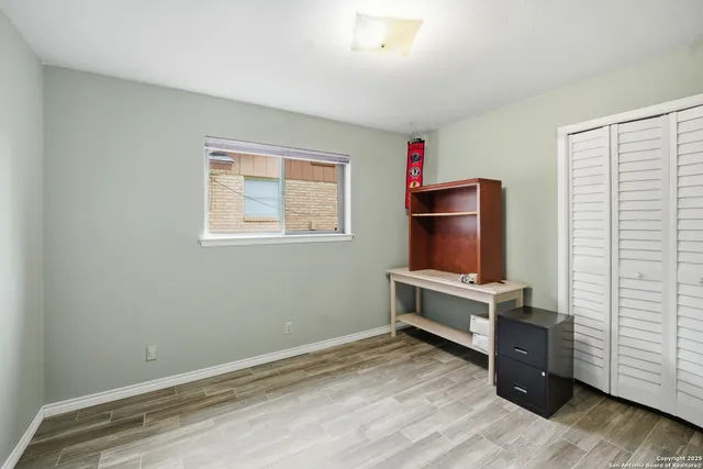 a room with furniture and window