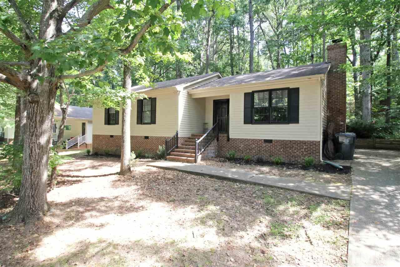7420 Post Oak Road Raleigh, NC 27615 - Photo 1 of 22 a view of a house with a patio