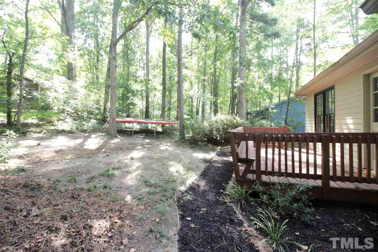 7420 Post Oak Road Raleigh, NC 27615 - Photo 17 of 22 a view of backyard with green space