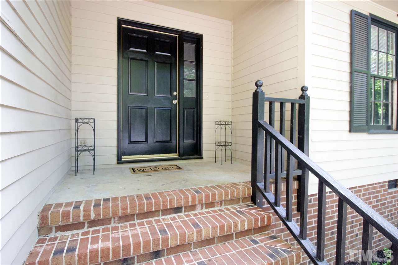 7420 Post Oak Road Raleigh, NC 27615 - Photo 3 of 22 a view of a house with deck and furniture